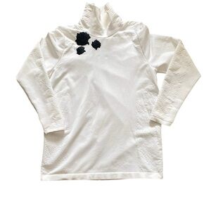 Athleta Woman’s Flurry Blizzard Rib turtleneck White with Black Floral Appliqué